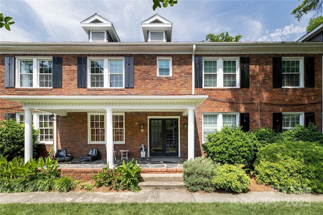 524 Hawthorne Ln, Charlotte, NC 28204 - colonial house with brick siding and a porch