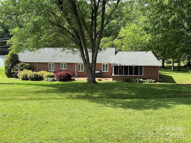 3586 US-70 Rd W, Marion, NC 28752 - view of front of property with brick siding and a front lawn