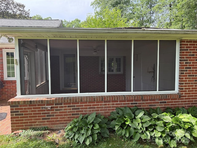 3586 US-70 Rd W, Marion, NC 28752 - view of side of property with a sunroom and brick siding