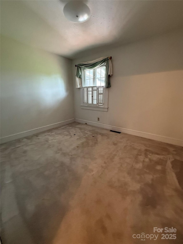 3586 US-70 Rd W, Marion, NC 28752 - empty room with baseboards and carpet floors