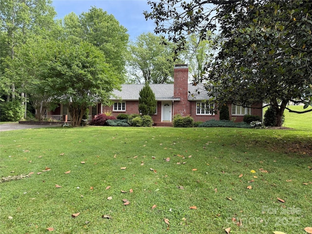 3586 US-70 Rd W, Marion, NC 28752 - ranch-style house featuring a front lawn, brick siding, and a chimney