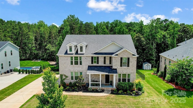 319 S San Agustin Dr, Mooresville, NC 28117 - view of front of home featuring brick siding and a front yard