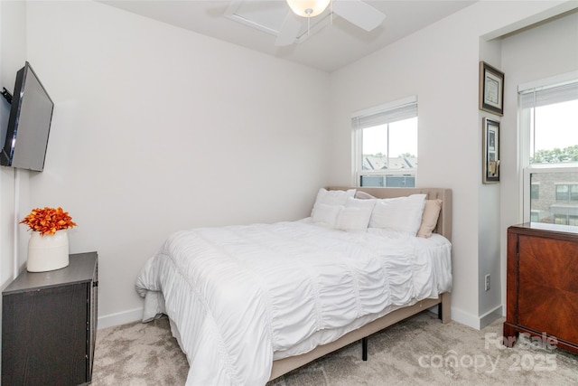 628 Uwharrie River Rd, Charlotte, NC 28211 - carpeted bedroom with multiple windows, baseboards, and ceiling fan