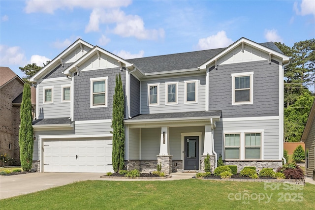11209 Flenniken Ct, Charlotte, NC 28277 - craftsman-style house featuring concrete driveway, stone siding, an attached garage, a front yard, and board and batten siding