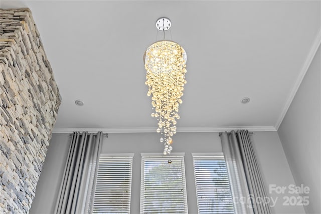 11209 Flenniken Ct, Charlotte, NC 28277 - detailed view of a chandelier and ornamental molding
