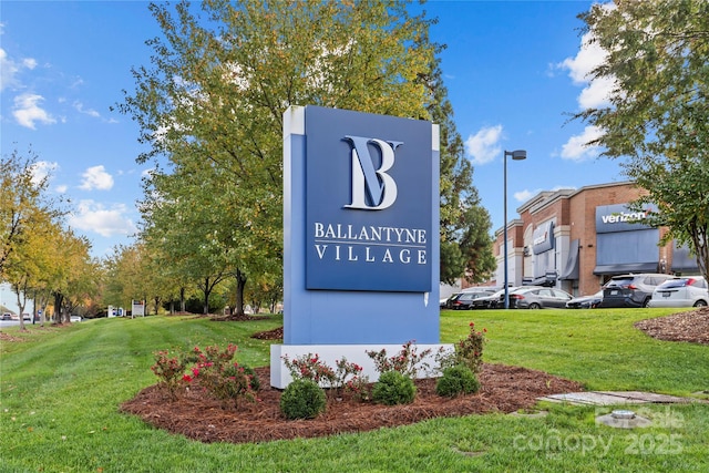 11209 Flenniken Ct, Charlotte, NC 28277 - community sign with a lawn