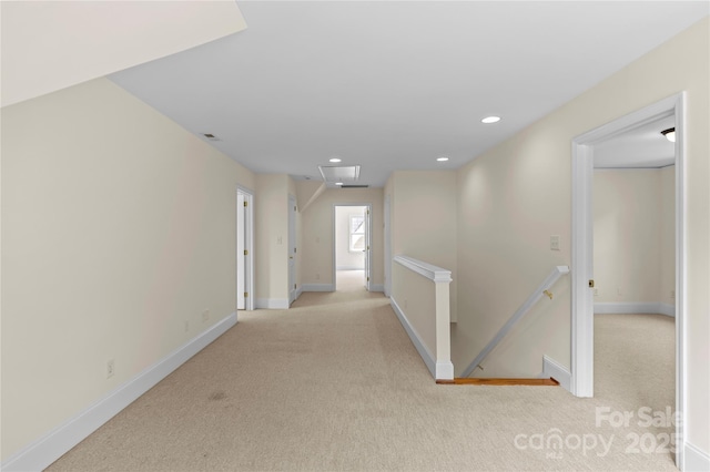 1500 Lynway Dr, Charlotte, NC 28203 - hallway featuring an upstairs landing, carpet, recessed lighting, and baseboards