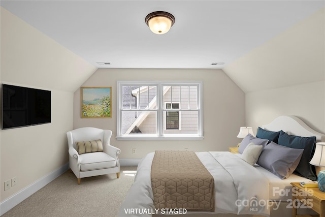 1500 Lynway Dr, Charlotte, NC 28203 - carpeted bedroom with baseboards and lofted ceiling