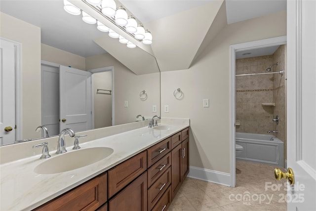 1500 Lynway Dr, Charlotte, NC 28203 - full bath with tile patterned flooring, double vanity, tub / shower combination, and baseboards