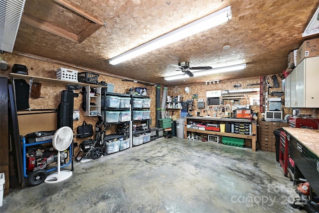 3017 Brooks Mill Ln, Wingate, NC 28174 - garage featuring a workshop area and a ceiling fan