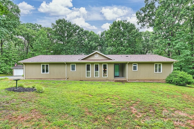 3017 Brooks Mill Ln, Wingate, NC 28174 - single story home featuring a front yard and an outbuilding