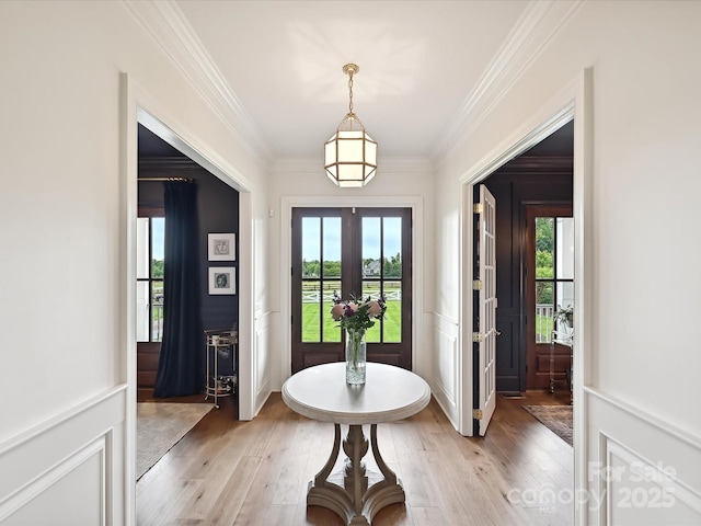 735 Davidson Run Ln, Davidson, NC 28036 - entrance foyer with crown molding, light wood-type flooring, plenty of natural light, and french doors