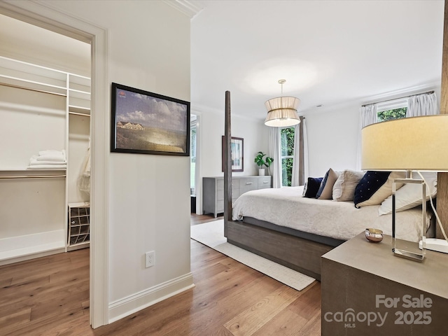 735 Davidson Run Ln, Davidson, NC 28036 - bedroom with wood finished floors and baseboards