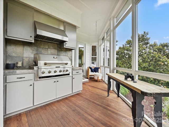 735 Davidson Run Ln, Davidson, NC 28036 - kitchen with wall chimney exhaust hood, decorative backsplash, wood-type flooring, and healthy amount of natural light