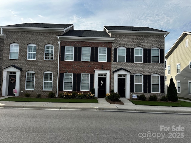 110 W Pine St, Lincolnton, NC 28092 - view of front facade featuring brick siding