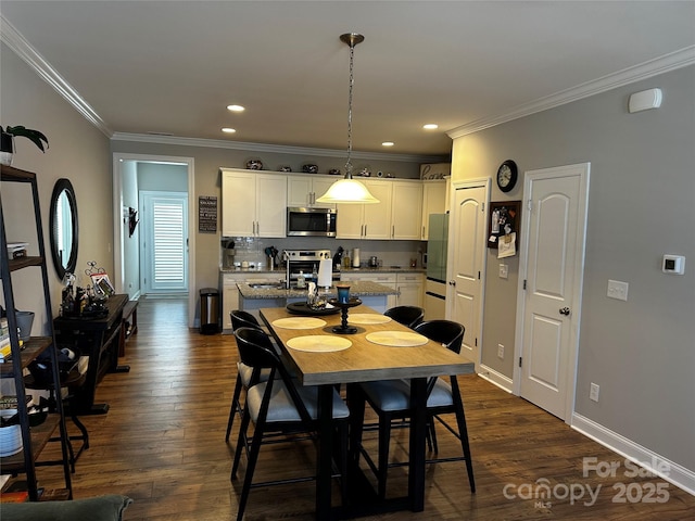 110 W Pine St, Lincolnton, NC 28092 - dining space featuring ornamental molding, dark wood finished floors, and recessed lighting