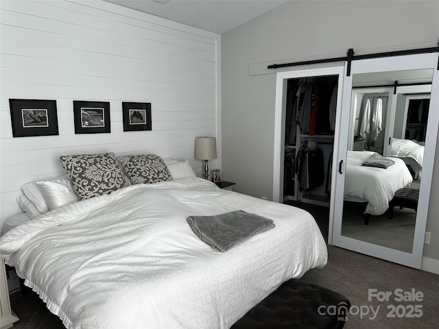 110 W Pine St, Lincolnton, NC 28092 - bedroom featuring carpet, a closet, a barn door, and lofted ceiling