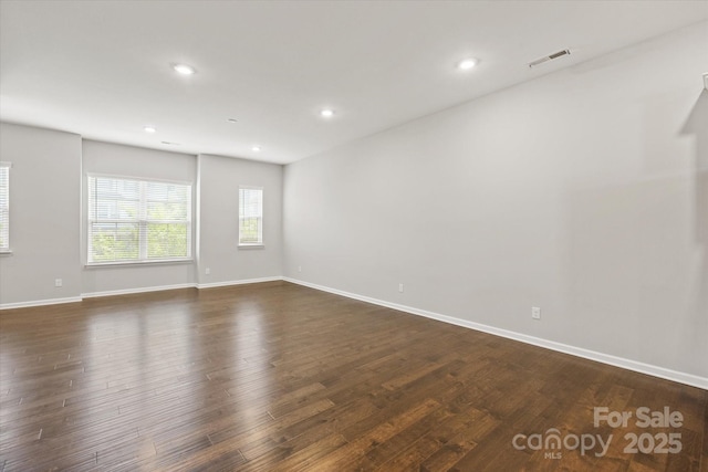 1142 Doveridge St, Charlotte, NC 28273 - unfurnished room featuring dark wood-type flooring, recessed lighting, and baseboards