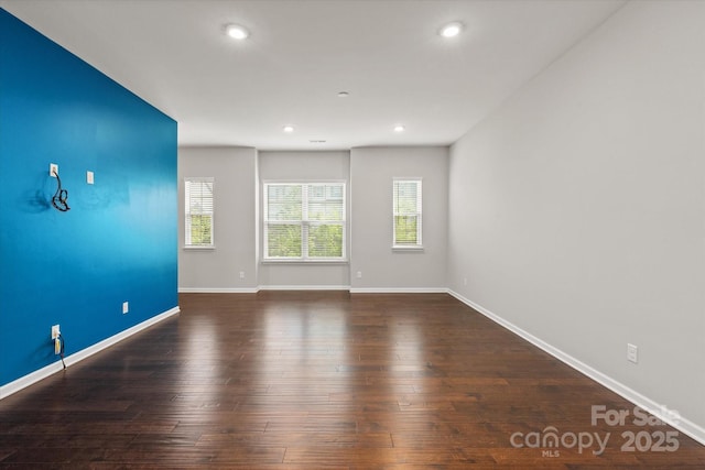 1142 Doveridge St, Charlotte, NC 28273 - spare room with recessed lighting, baseboards, and wood finished floors