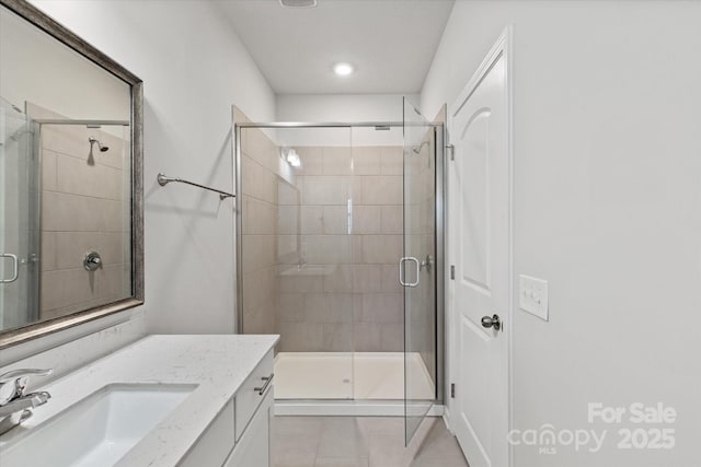 1142 Doveridge St, Charlotte, NC 28273 - full bath featuring tile patterned flooring, vanity, a stall shower, and recessed lighting