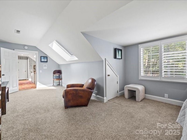 15 Old Stage Trl, Clover, SC 29710 - living area with a skylight, carpet floors, baseboards, and lofted ceiling
