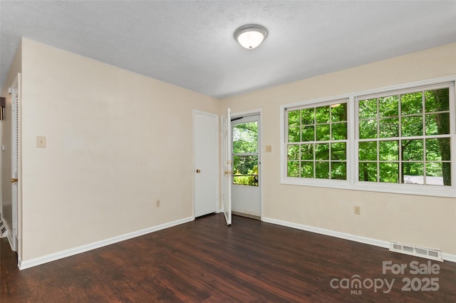 25 Evelake Dr, Asheville, NC 28806 - empty room featuring wood finished floors and baseboards