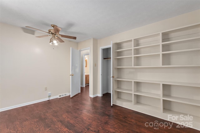 25 Evelake Dr, Asheville, NC 28806 - unfurnished bedroom featuring wood finished floors, baseboards, and ceiling fan