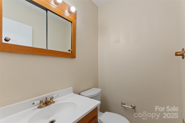 25 Evelake Dr, Asheville, NC 28806 - half bathroom featuring toilet and vanity