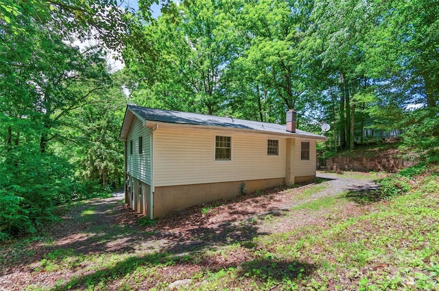 25 Evelake Dr, Asheville, NC 28806 - view of property exterior featuring a chimney
