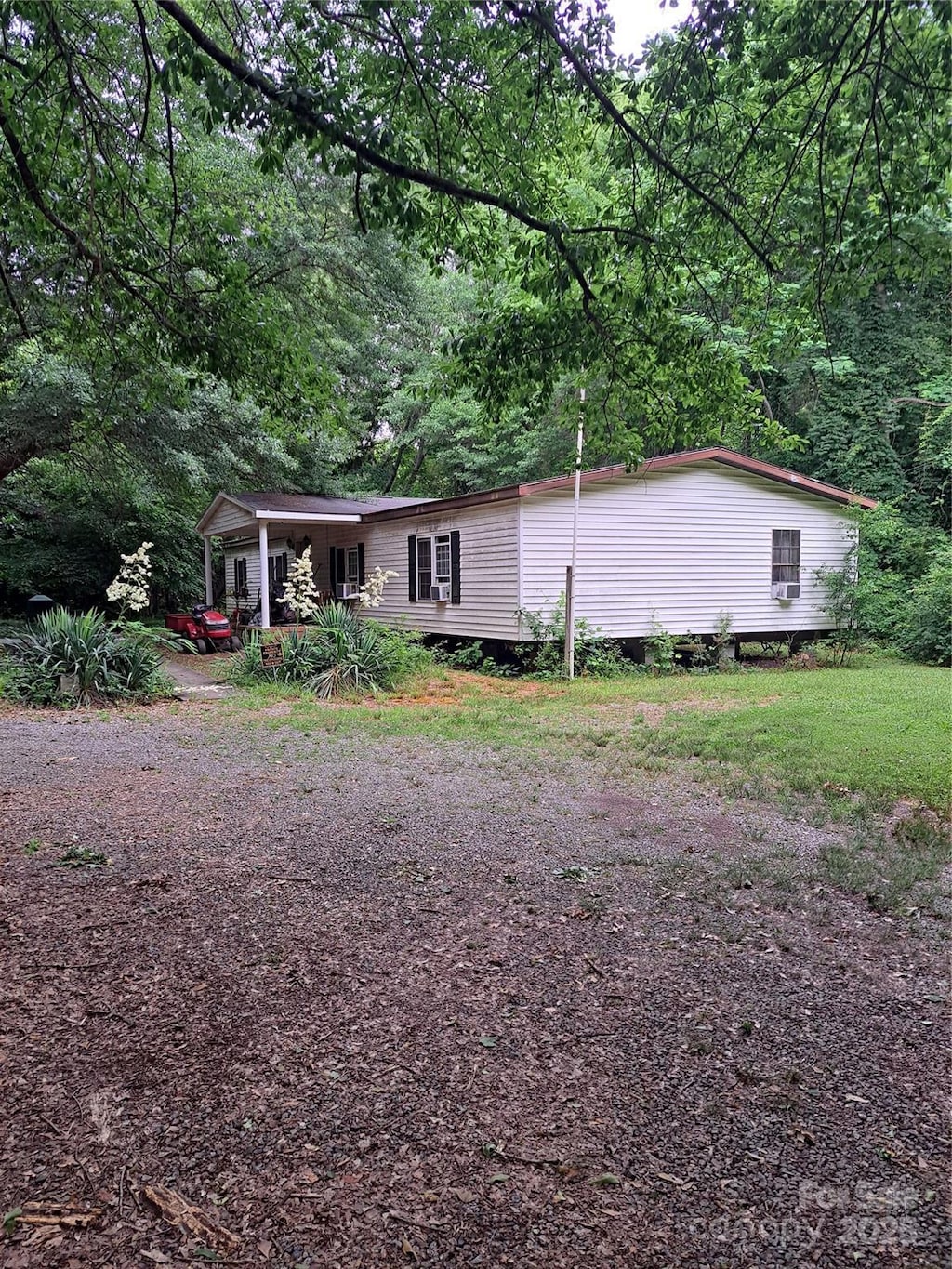 5023 Dogwood Ln, Stanley, NC 28164 - view of front of home featuring a porch