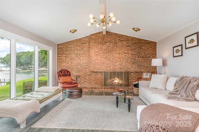 5114 Leisure Ln, Sherrills Ford, NC 28673 - living area featuring a water view, brick wall, a chandelier, wood finished floors, and a fireplace