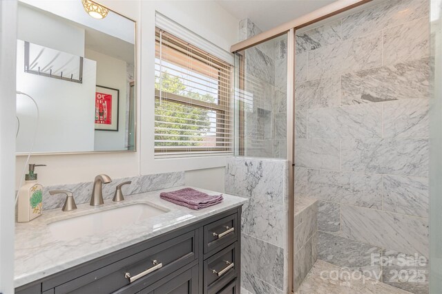 5114 Leisure Ln, Sherrills Ford, NC 28673 - bathroom featuring a tile shower and vanity