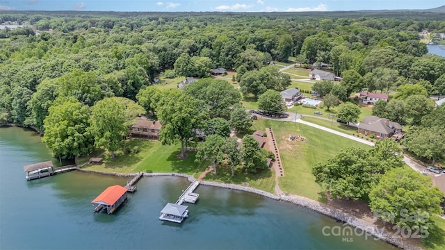 5114 Leisure Ln, Sherrills Ford, NC 28673 - drone / aerial view of a heavily wooded area and a nearby body of water