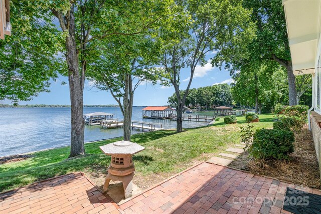 5114 Leisure Ln, Sherrills Ford, NC 28673 - view of grassy yard with a water view and a boat dock