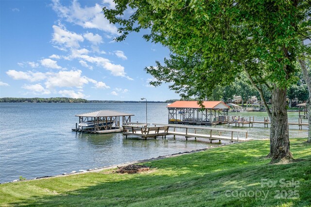 5114 Leisure Ln, Sherrills Ford, NC 28673 - dock area with boat lift, a water view, and a yard