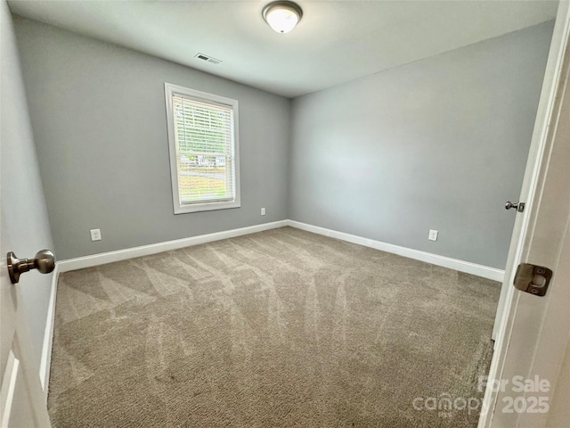 212 Old Centergrove Rd, Kannapolis, NC 28083 - spare room with baseboards and carpet floors