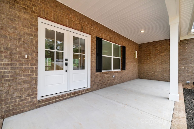 5025 Harbor View Dr E, Granite Falls, NC 28630 - property entrance featuring brick siding, french doors, and a patio