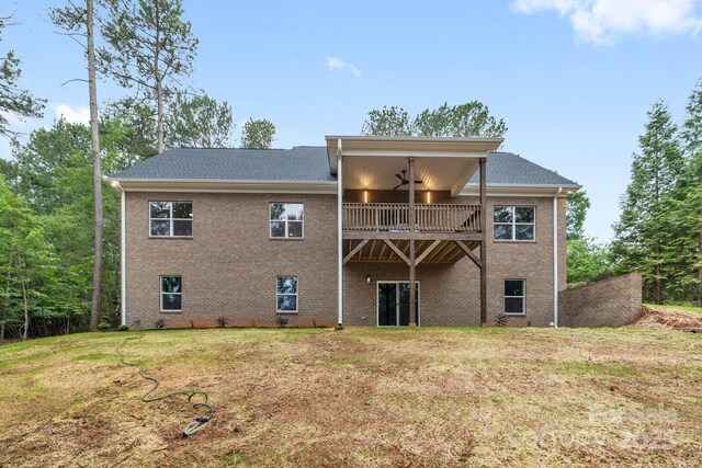 5025 Harbor View Dr E, Granite Falls, NC 28630 - rear view of property featuring a yard, brick siding, and a balcony