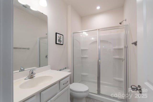 1004 Earlston Rd, Indian Trail, NC 28079 - bathroom with a shower stall, vanity, toilet, and recessed lighting