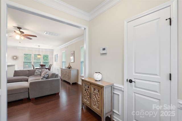 4278 Park S Station Blvd, Charlotte, NC 28210 - living area featuring crown molding, dark wood finished floors, and a ceiling fan