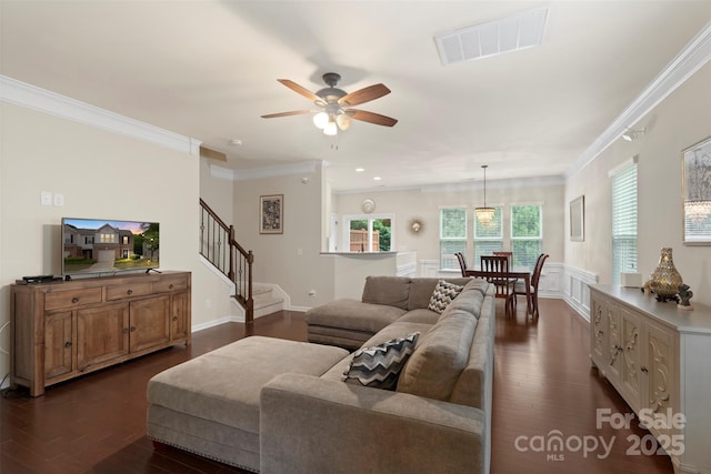 4278 Park S Station Blvd, Charlotte, NC 28210 - living area with dark wood-style floors, ornamental molding, stairs, ceiling fan, and baseboards