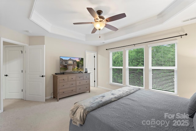 4278 Park S Station Blvd, Charlotte, NC 28210 - bedroom with a raised ceiling, ornamental molding, light carpet, ceiling fan, and baseboards