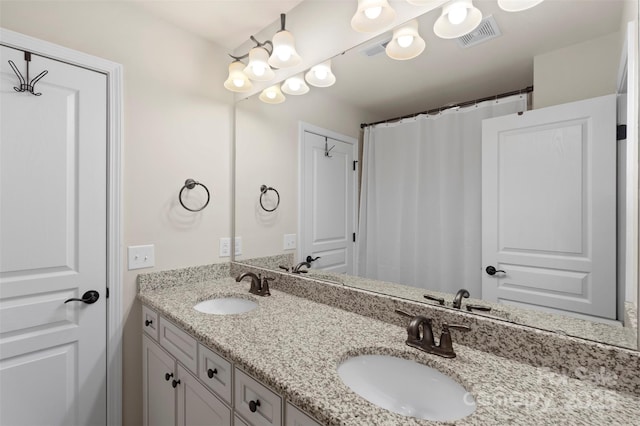 4278 Park S Station Blvd, Charlotte, NC 28210 - bathroom with double vanity and a shower with shower curtain