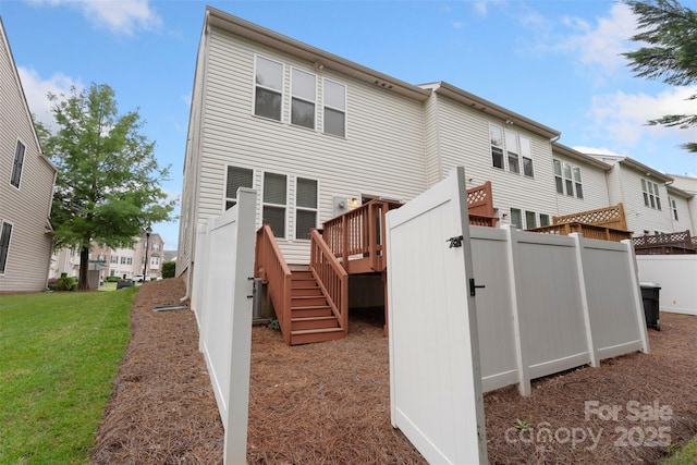 4278 Park S Station Blvd, Charlotte, NC 28210 - back of property featuring a deck, stairway, and a residential view