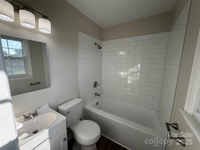 1735 Hollandale Dr, Gastonia, NC 28054 - bathroom featuring toilet, vanity, bathtub / shower combination, and wood finished floors
