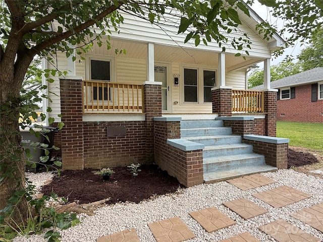 1102 Venus St, Kannapolis, NC 28083 - entrance to property with covered porch and brick siding