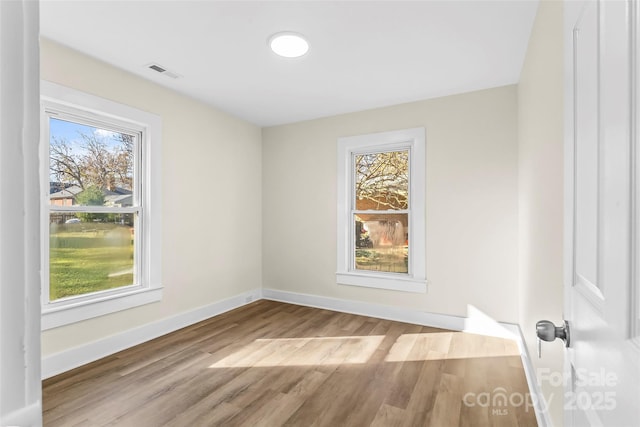 1102 Venus St, Kannapolis, NC 28083 - unfurnished room with wood finished floors and baseboards