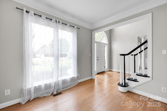 12711 Duncourtney Ln, Charlotte, NC 28277 - entryway with wood finished floors, ornamental molding, baseboards, and stairs