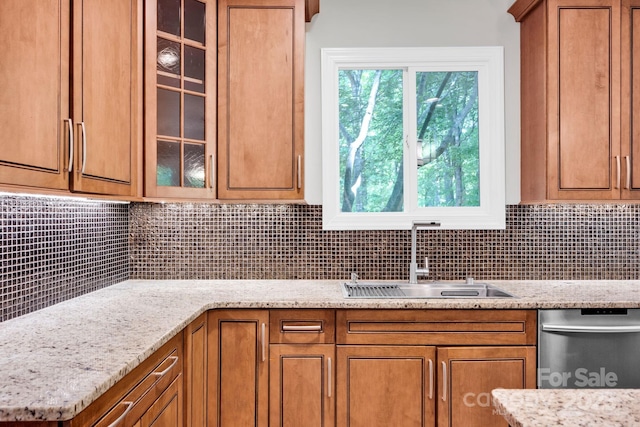 12711 Duncourtney Ln, Charlotte, NC 28277 - kitchen featuring a sink, dishwasher, and brown cabinets