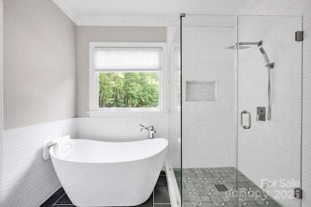 12711 Duncourtney Ln, Charlotte, NC 28277 - full bath with tile walls, a stall shower, a freestanding bath, crown molding, and tile patterned floors